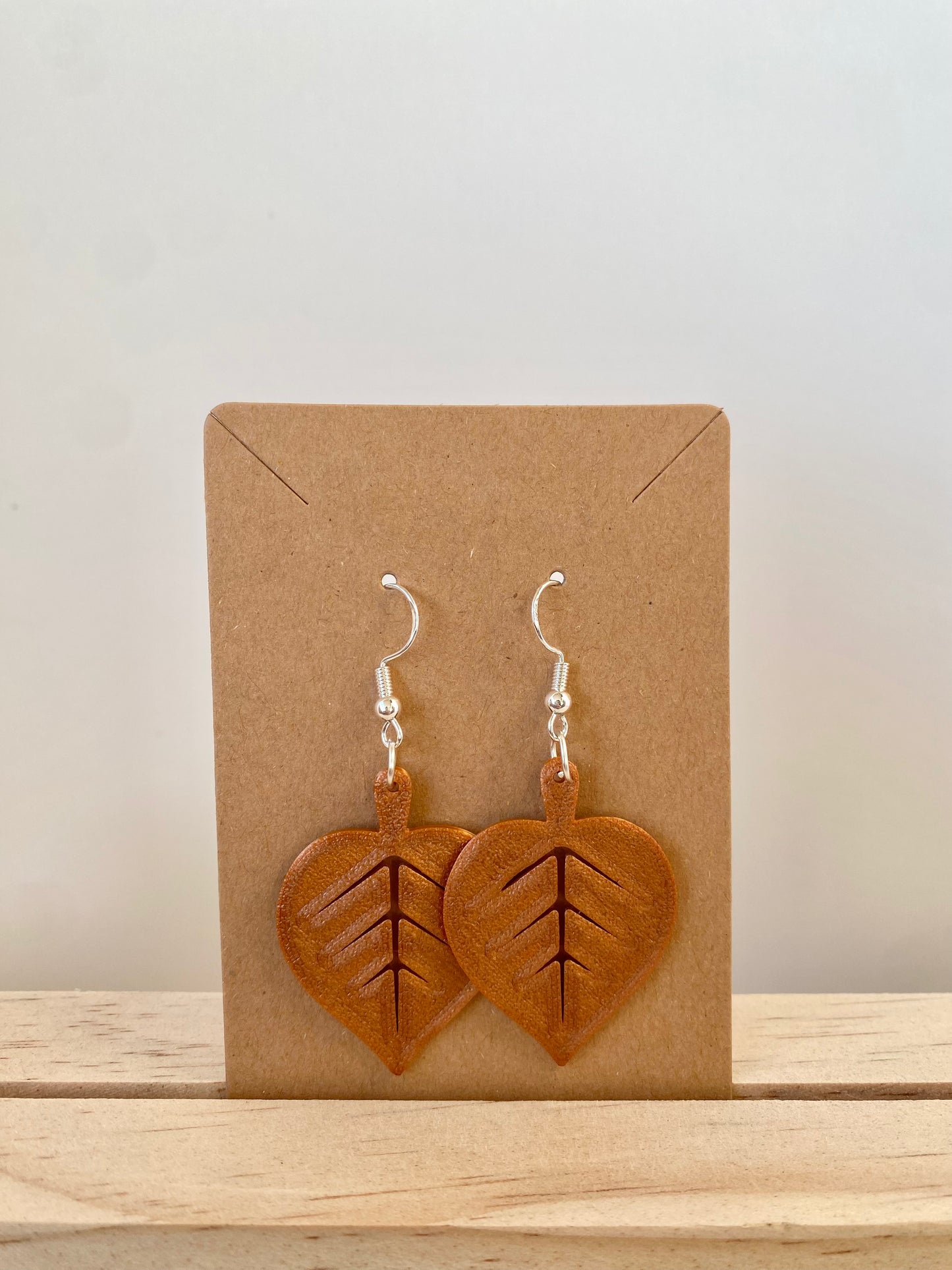 Autumn Lilac Leaf Earrings in copper.