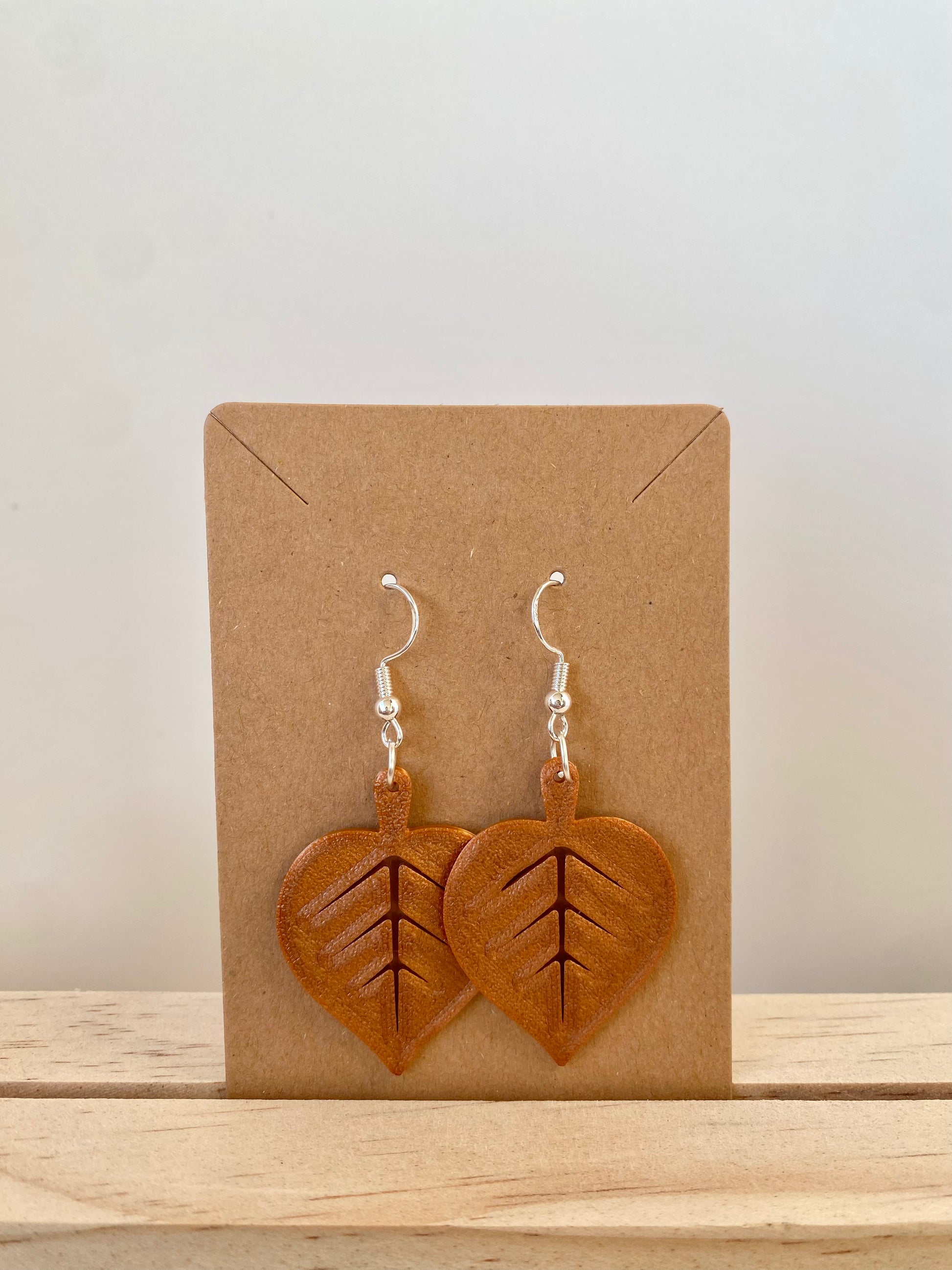 Autumn Lilac Leaf Earrings in copper.