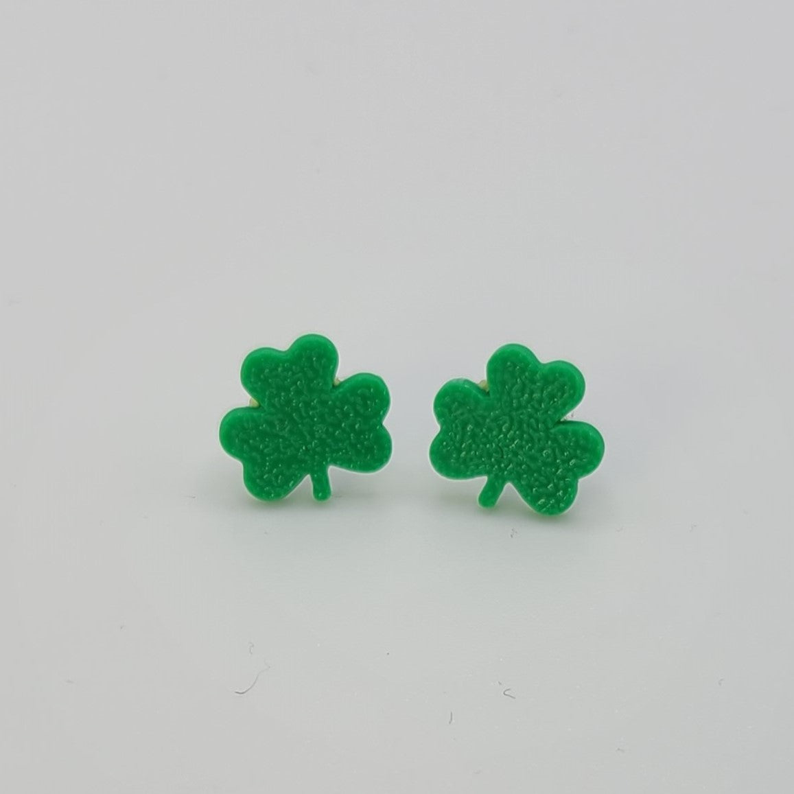 Clover Stud Earrings in green.