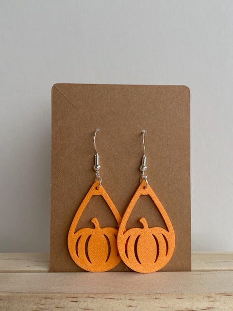 Pumpkin Teardrop Earrings I in orange.