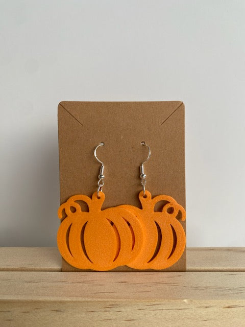 Pumpkin Earrings III in orange.