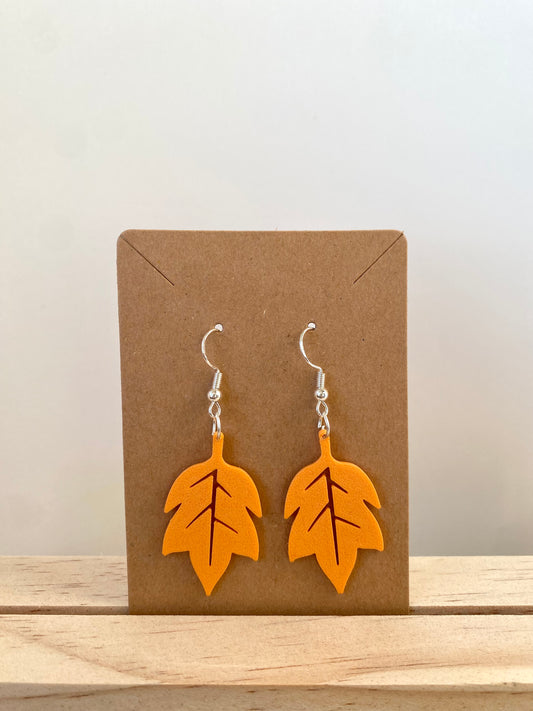 Autumn Red Oak Leaf Earrings in orange.