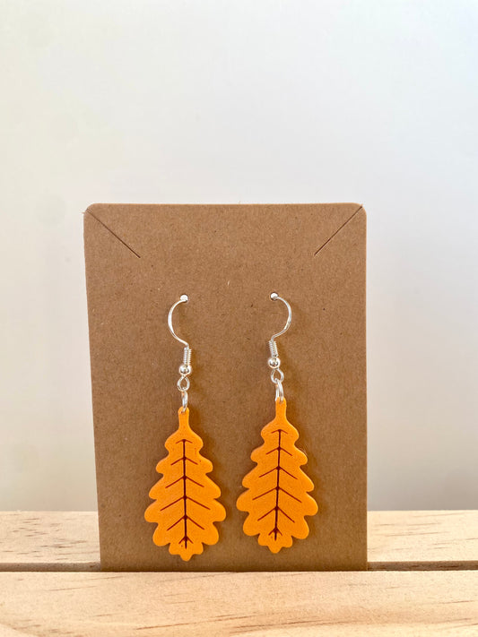 Autumn White Oak Leaf Earrings I in orange.