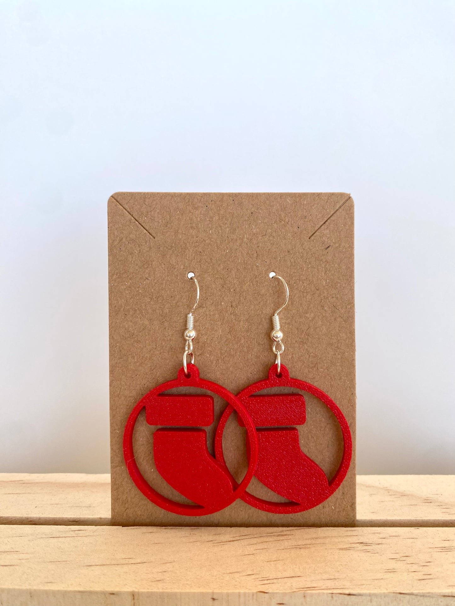 Circle Stocking Earrings in red.