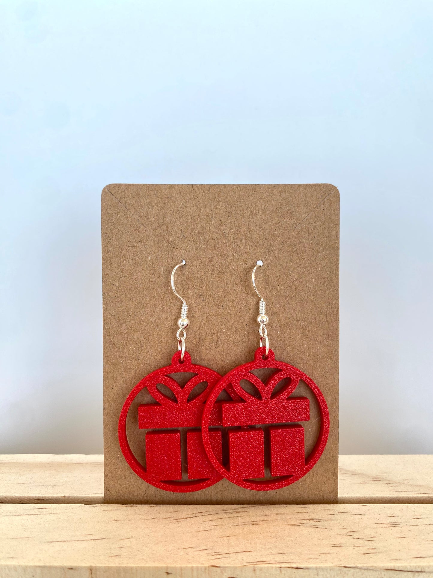 Circle Christmas Gift Earrings in red.