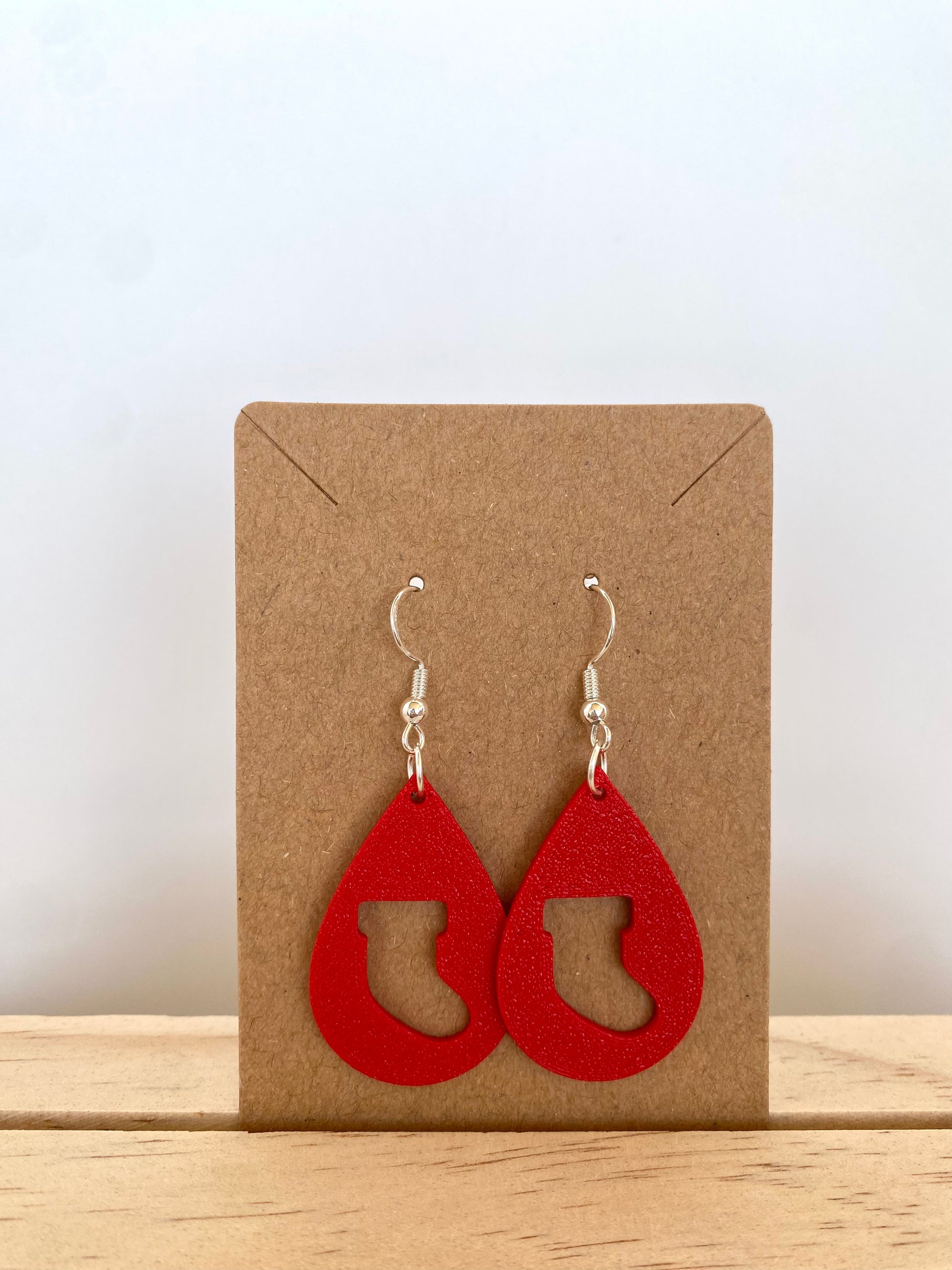 Teardrop Stocking Silhouette Earrings in red.