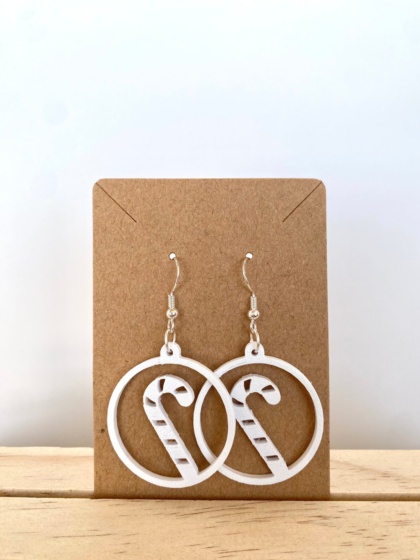 Circle Candy Cane Earrings in white.