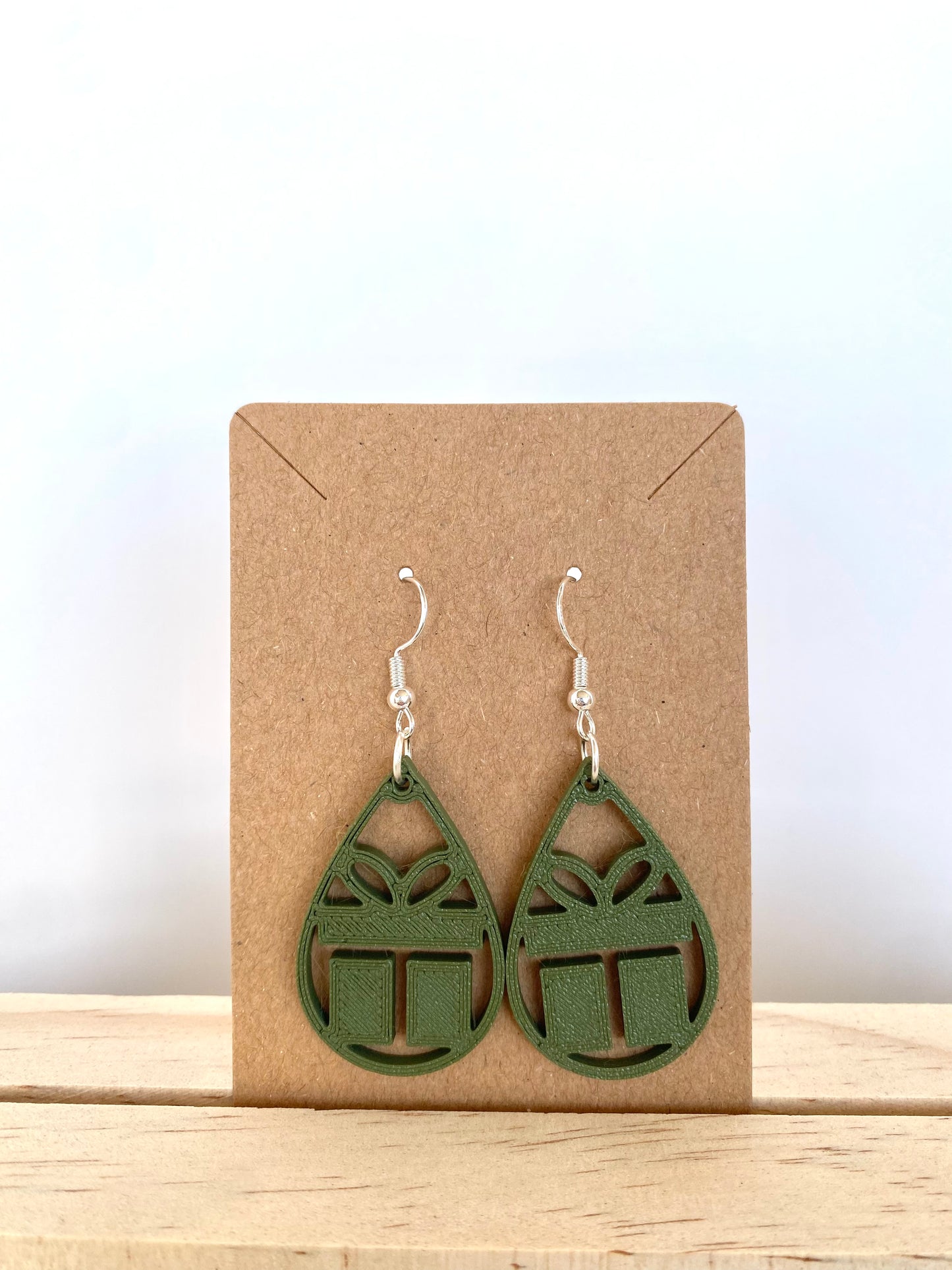 Teardrop Christmas Gift Earrings in green.