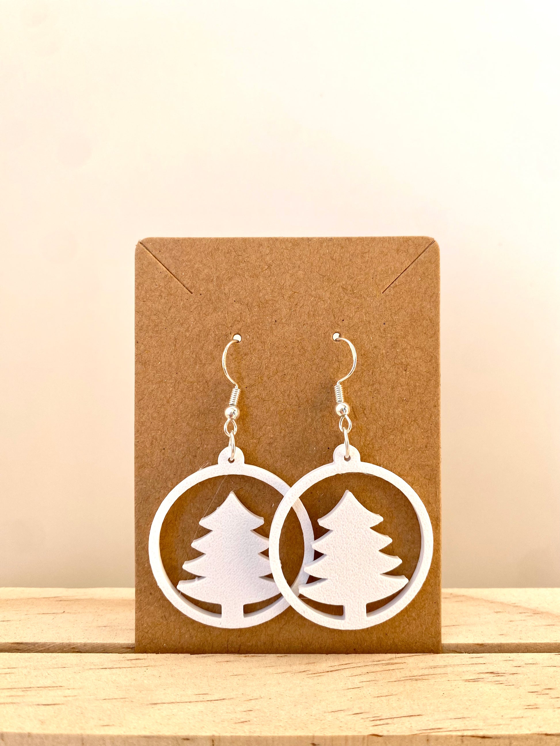 Circle Christmas Tree Earrings II in white.