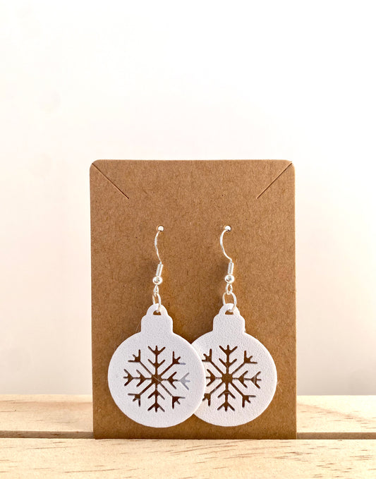 Snowflake Silhouette Ornament Earrings in white.