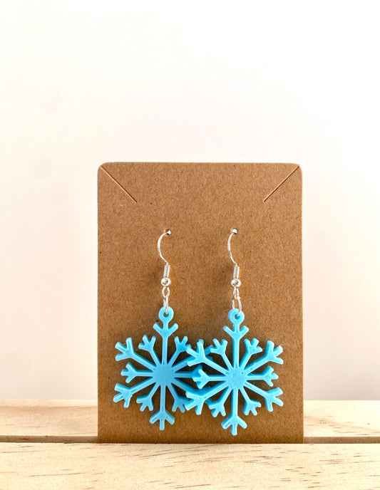 Snowflake Earrings II in light blue.